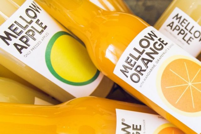 Bottles of Mellow Orange and Mellow Apple juice